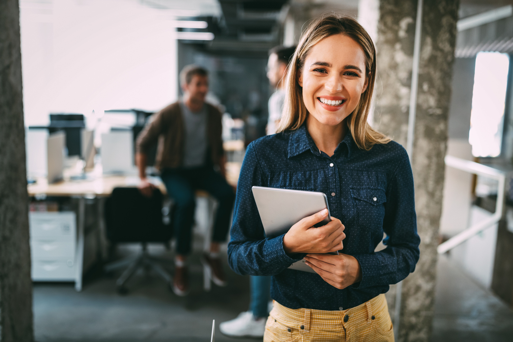 Successful company with happy employees in modern office